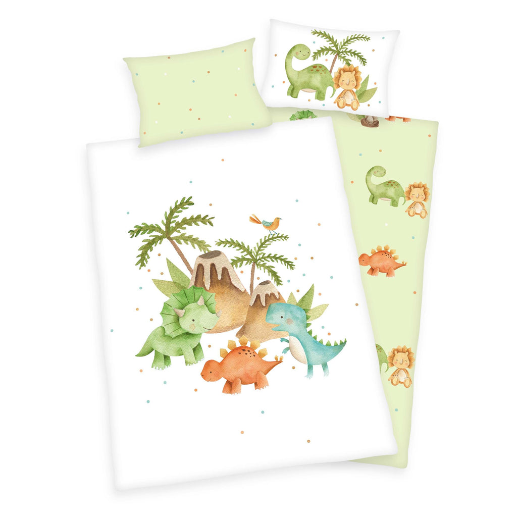 babybest Bettwäsche-Set ‘Dinos’ 100 x 135 cm: Bettbezug weiß mit Dinos unter Palmen vor zwei Vulkanen, Wendeseite hellgrün mit kleinen Dinos, Kissen 40 x 60 cm
