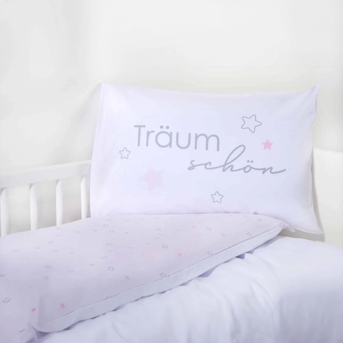 Kissen mit Träum schön auf der rosa Wendeseite