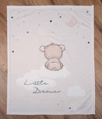 babybest Kuscheldecke ‘Little Dreamer’ ausgebreitet auf einem Holzboden