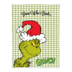 Grinch Kuscheldecke ‘Merry Grinchmas’ auf grün-weißem Karo mit Grinch-Gesicht, Weihnachtsmütze und Schriftzug Guess Who's Back, 150 x 200 cm