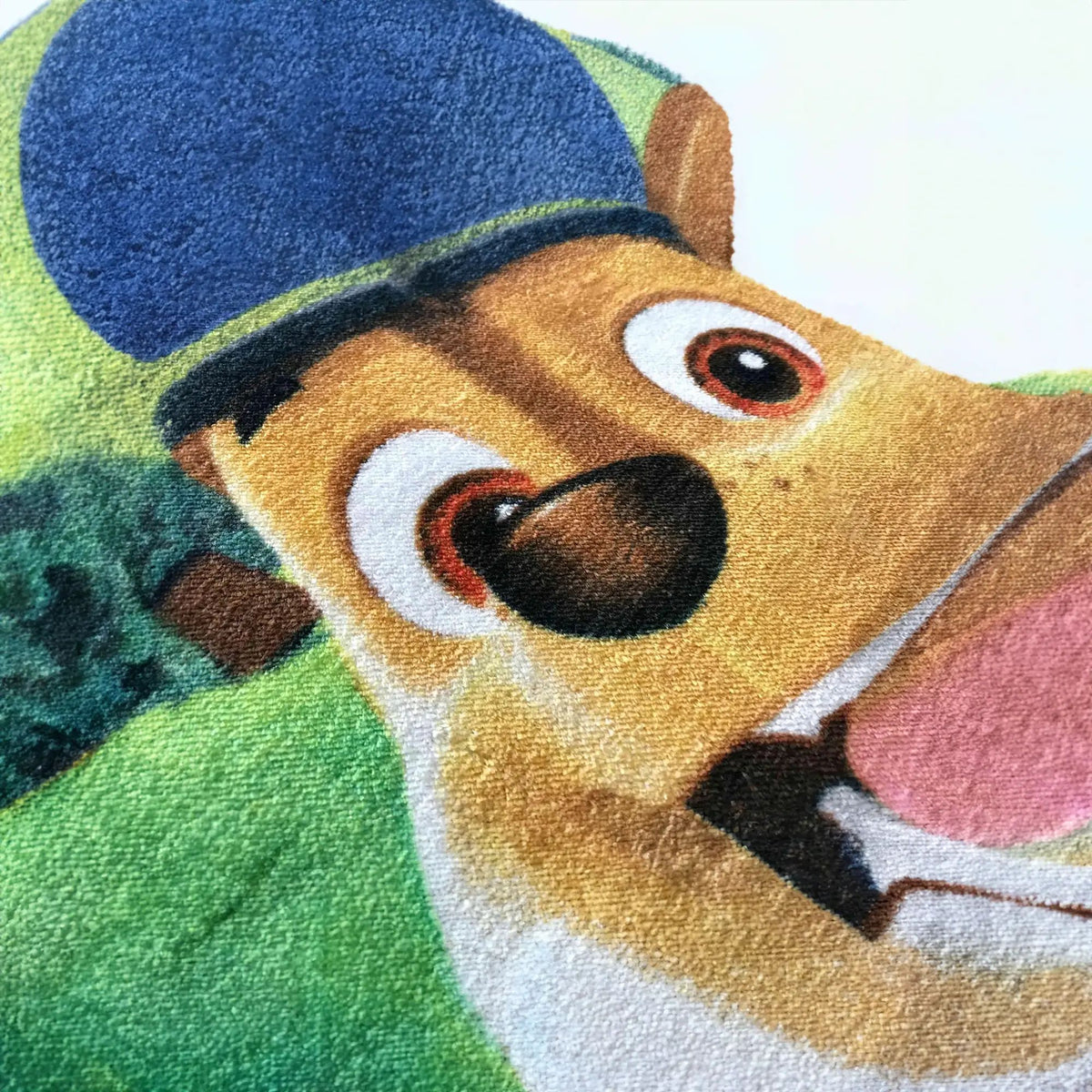 Nahaufnahme des Chase-Motivs auf dem Frottier des Paw Patrol Badetuchs