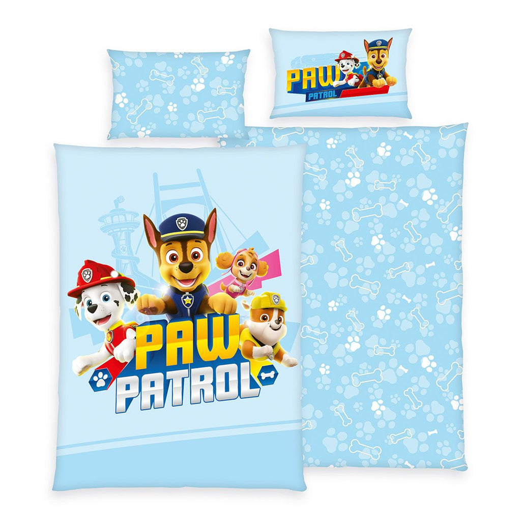 Paw Patrol Kleinkindbettwäsche-Set ‘Blue Mission’ 100 x 135 cm: Bettbezug hellblau mit Chase, Marshall, Skye und Rubble, Wendeseite mit Pfoten und Knochen, Kissen 40 x 60 cm