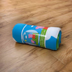 Aufgerollte Peppa Wutz Fleecedecke mit Banderole
