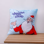 Hellblaues Kissen ‘Nordpol-Helden’: der Weihnachtsmann mit ausgestreckter Hand neben dem lila Schriftzug Weihnachtsmann & Co. KG