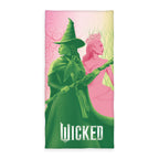 Wicked Handtuch ‘Mystic’ 75 x 150 cm: Elphaba in Grün und Glinda in Rosa über dem Schriftzug „Wicked“